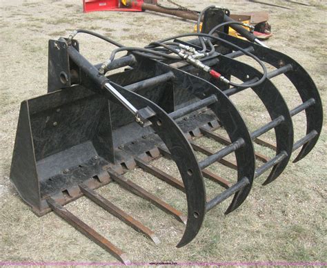 used skid steer grapple